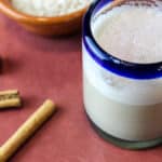 glass of vegan horchata with recipe ingredients.
